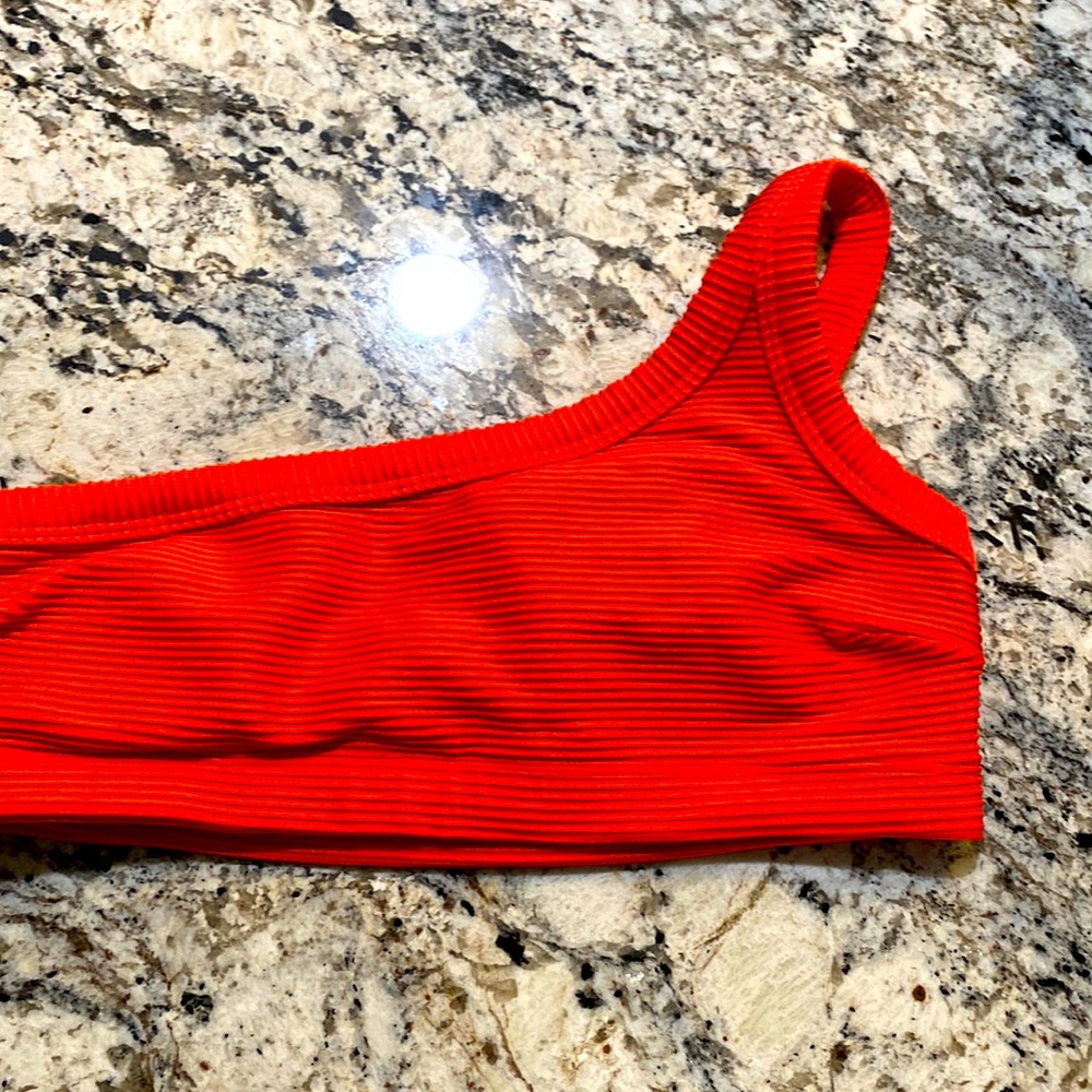 One shoulder swim top.